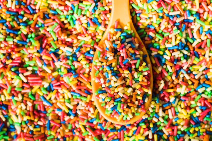 pile sprinkles wooden spoon 23 2147710854 - What Are Some of the Top Uses for Recycled Plastic Granules